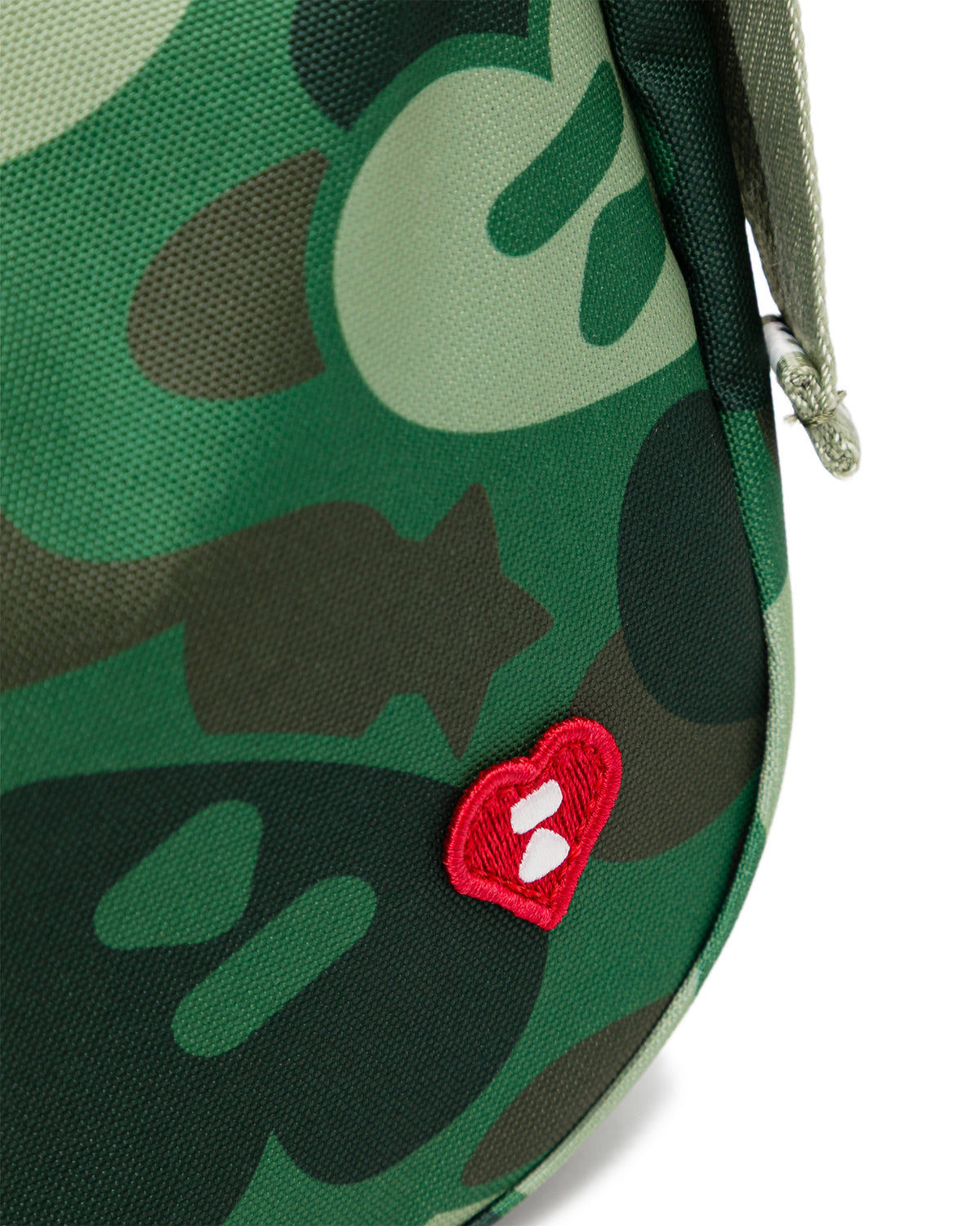 Heart badge crossbody camo mini bag
