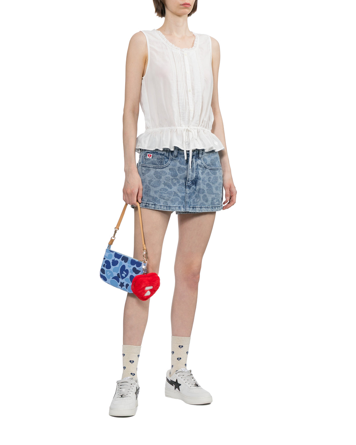 Sleeveless button-front top