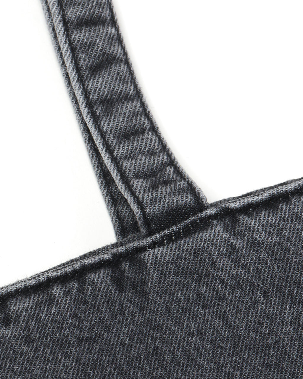 Coated denim punch tote bag