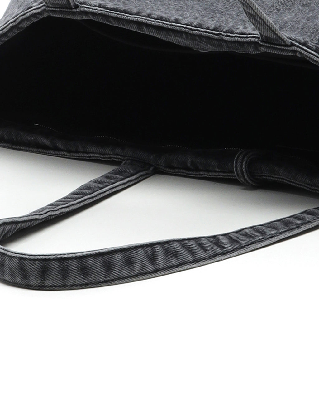 Coated denim punch tote bag