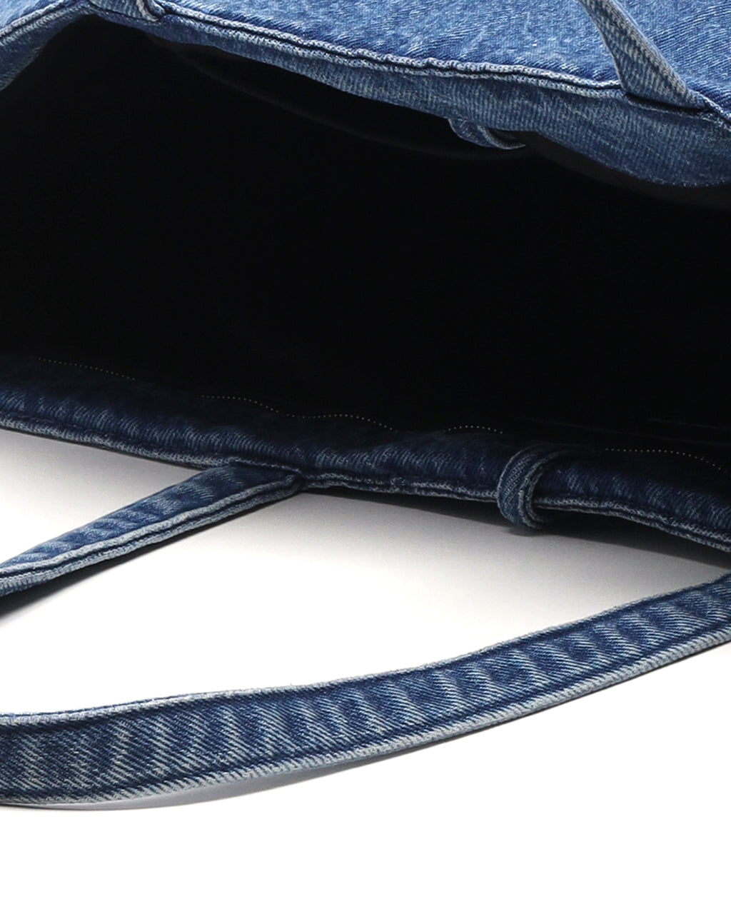 Coated denim punch tote bag
