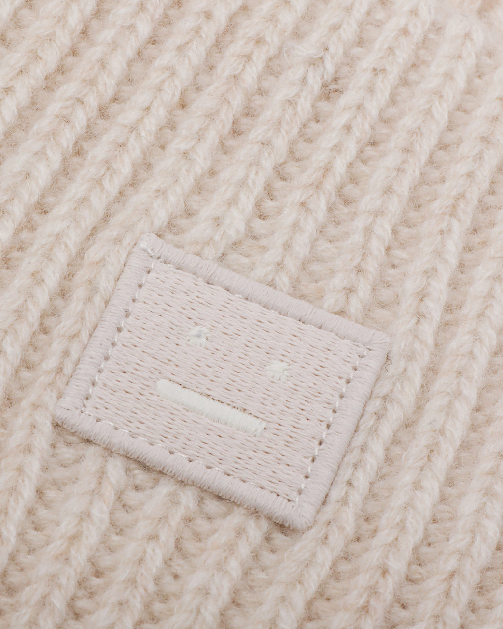 Small face logo beanie