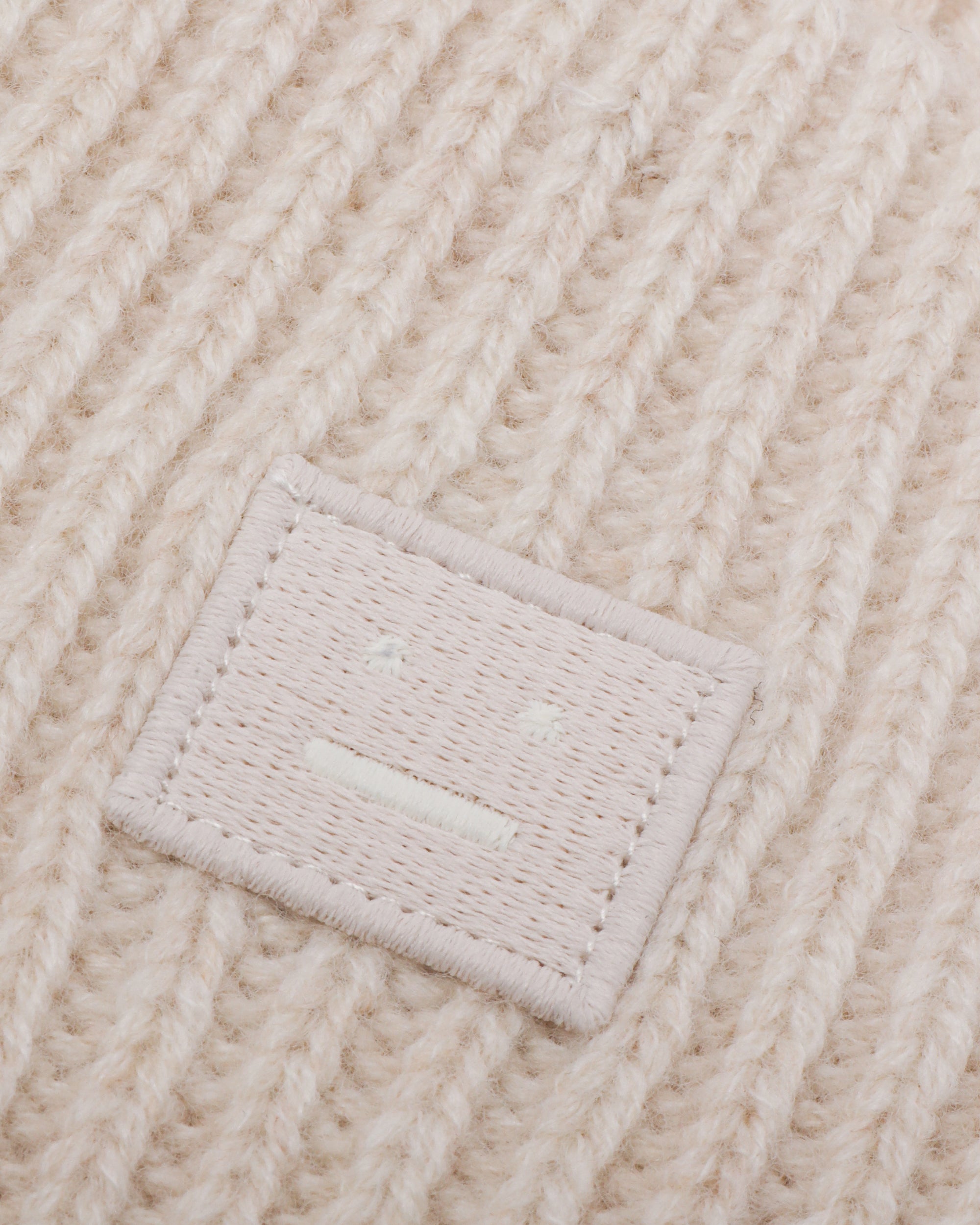 Small face logo beanie