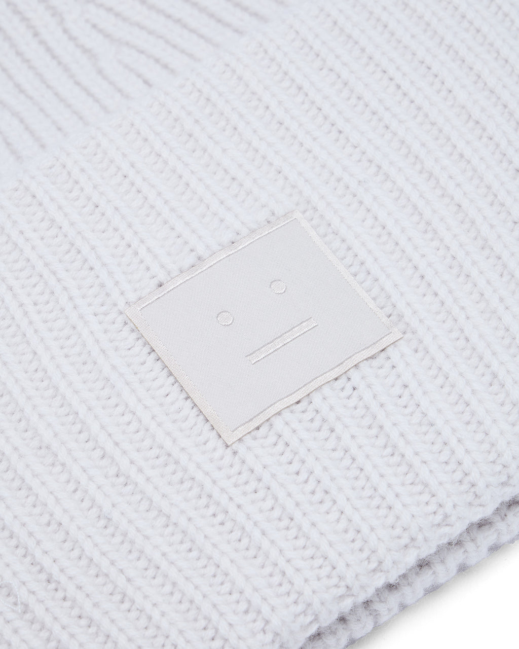 Face logo beanie