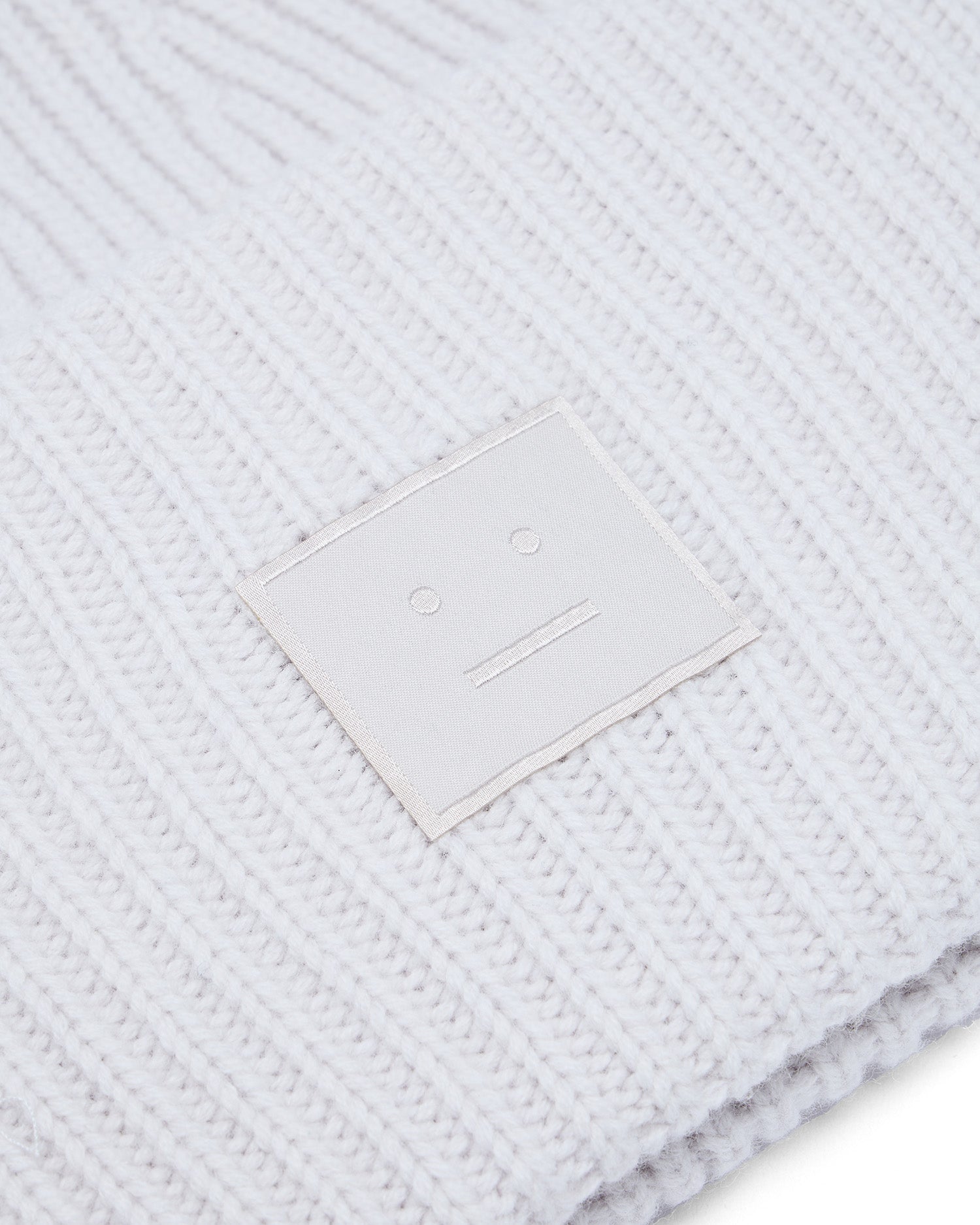 Face logo beanie