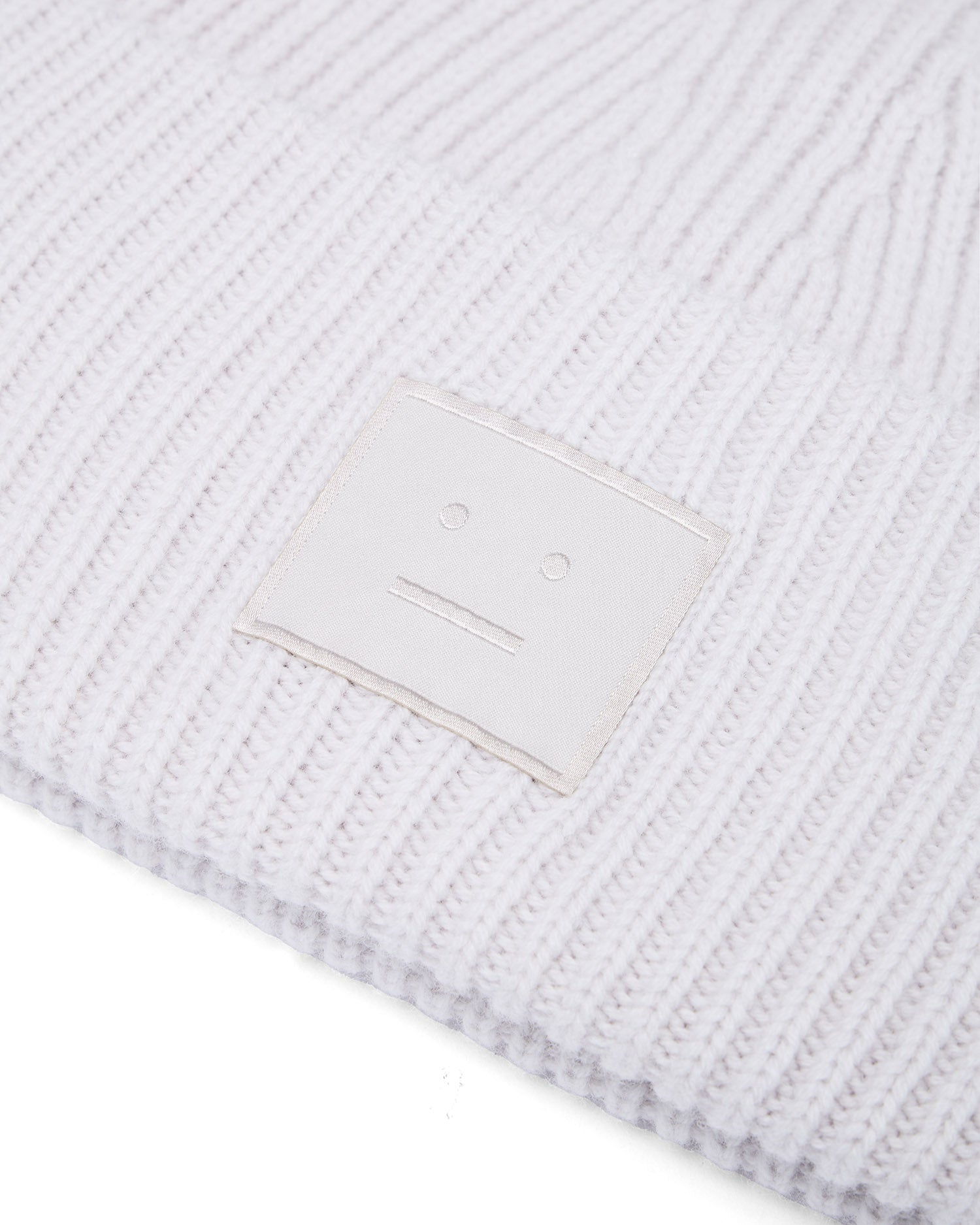 Face logo beanie