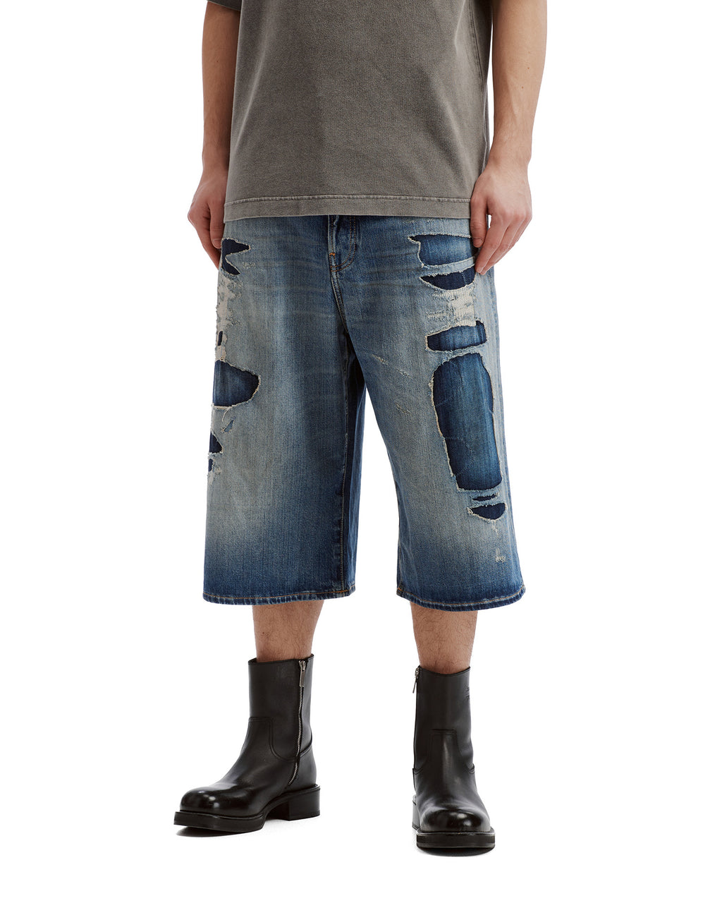 Mended denim shorts