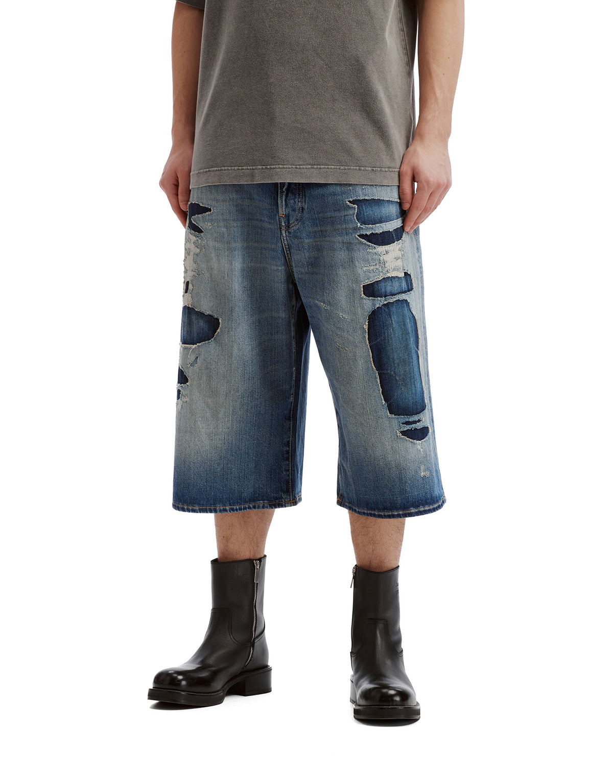 Mended denim shorts