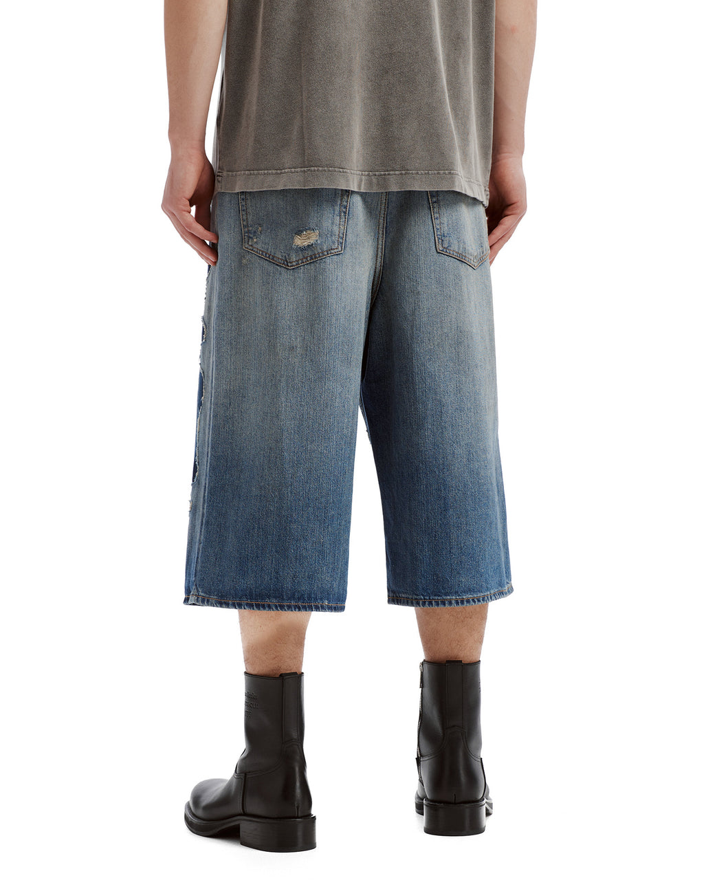 Mended denim shorts
