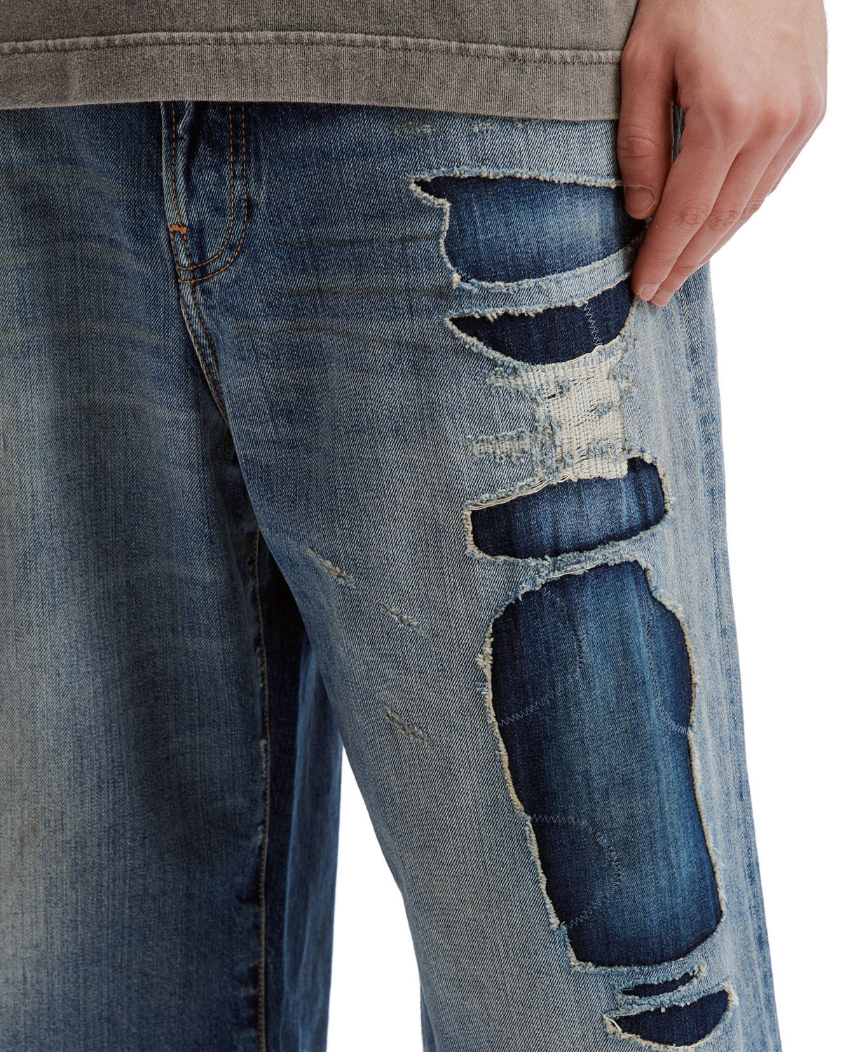 Mended denim shorts