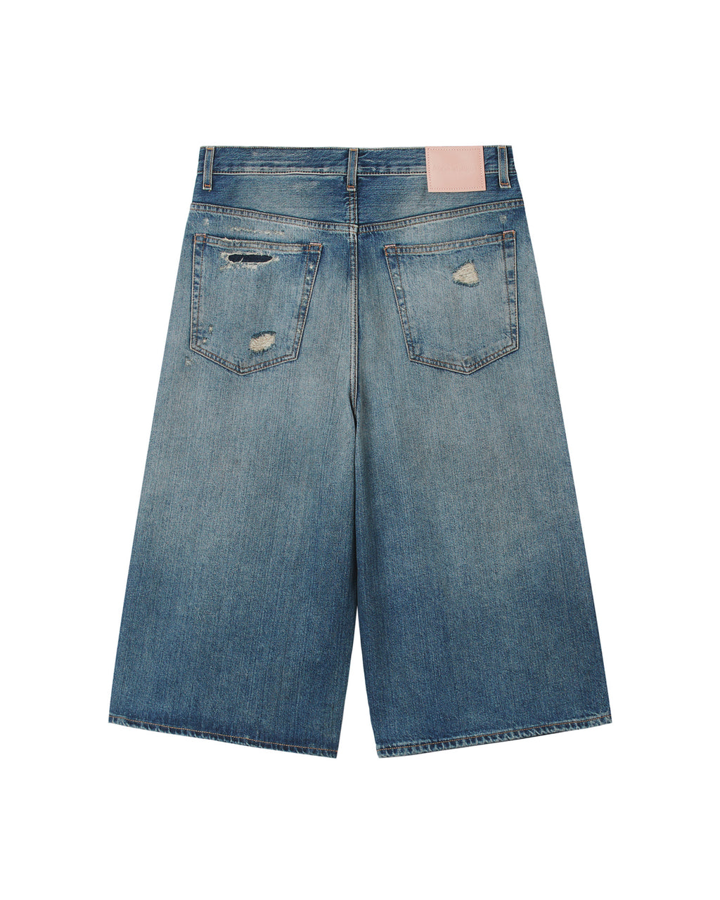 Mended denim shorts