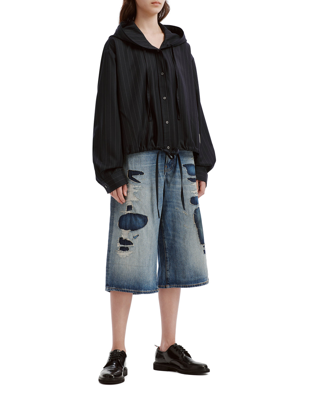 Mended denim shorts