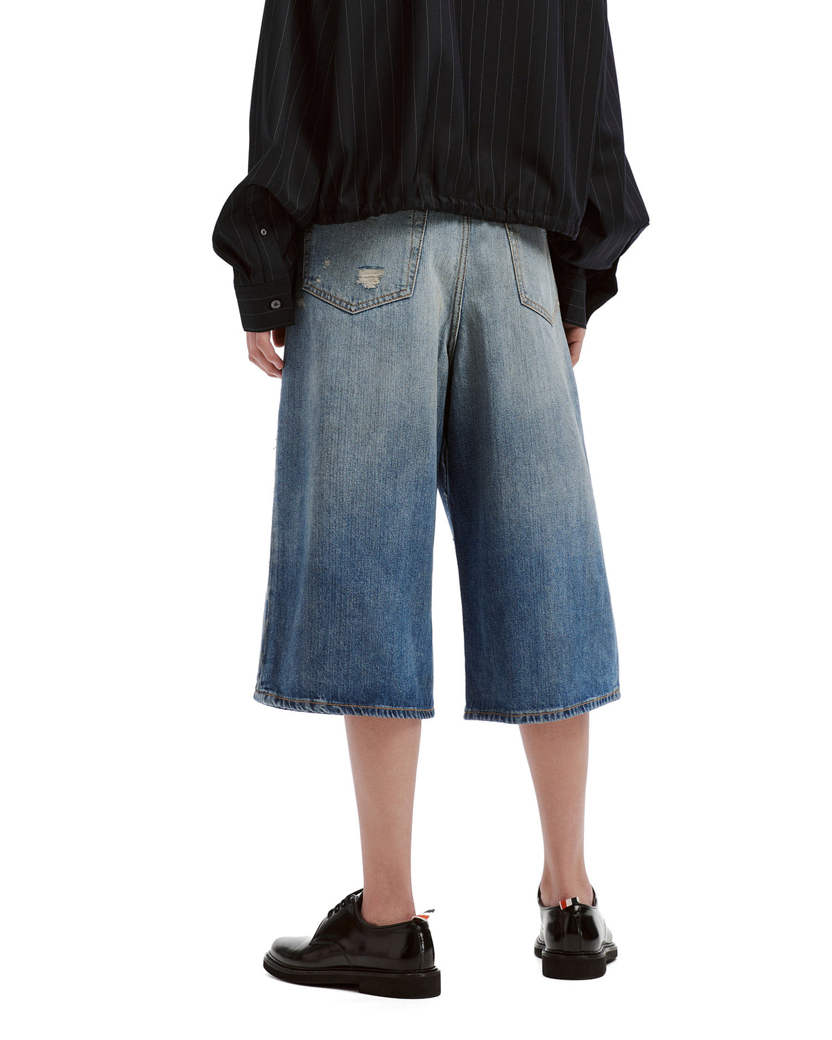 Mended denim shorts