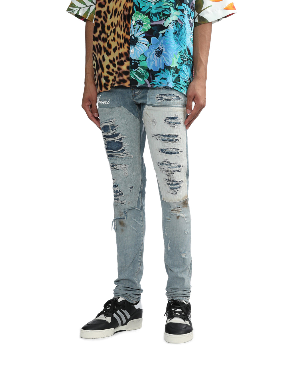 Distressed patchwork denim jeans