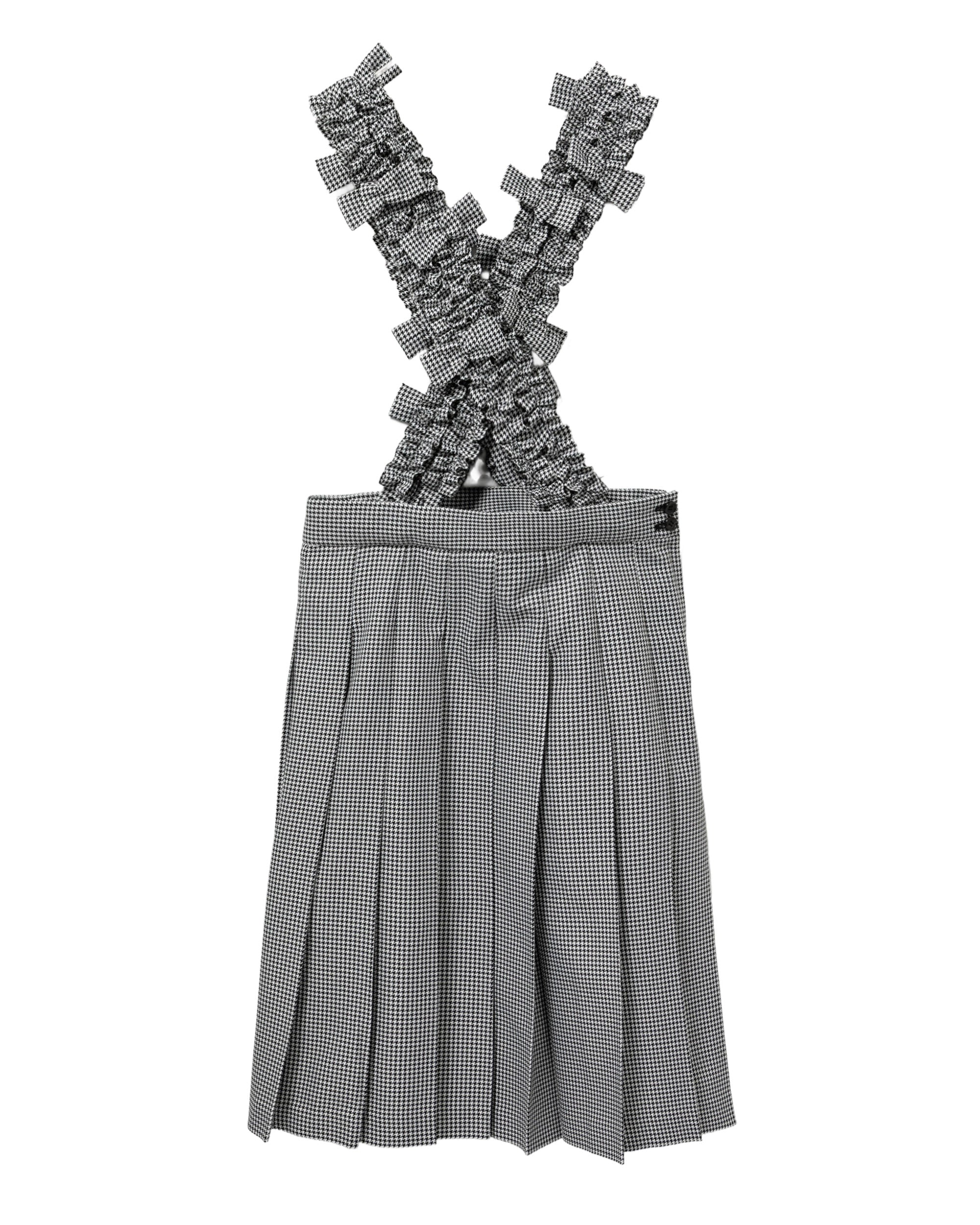 Pleated skirt with suspender straps