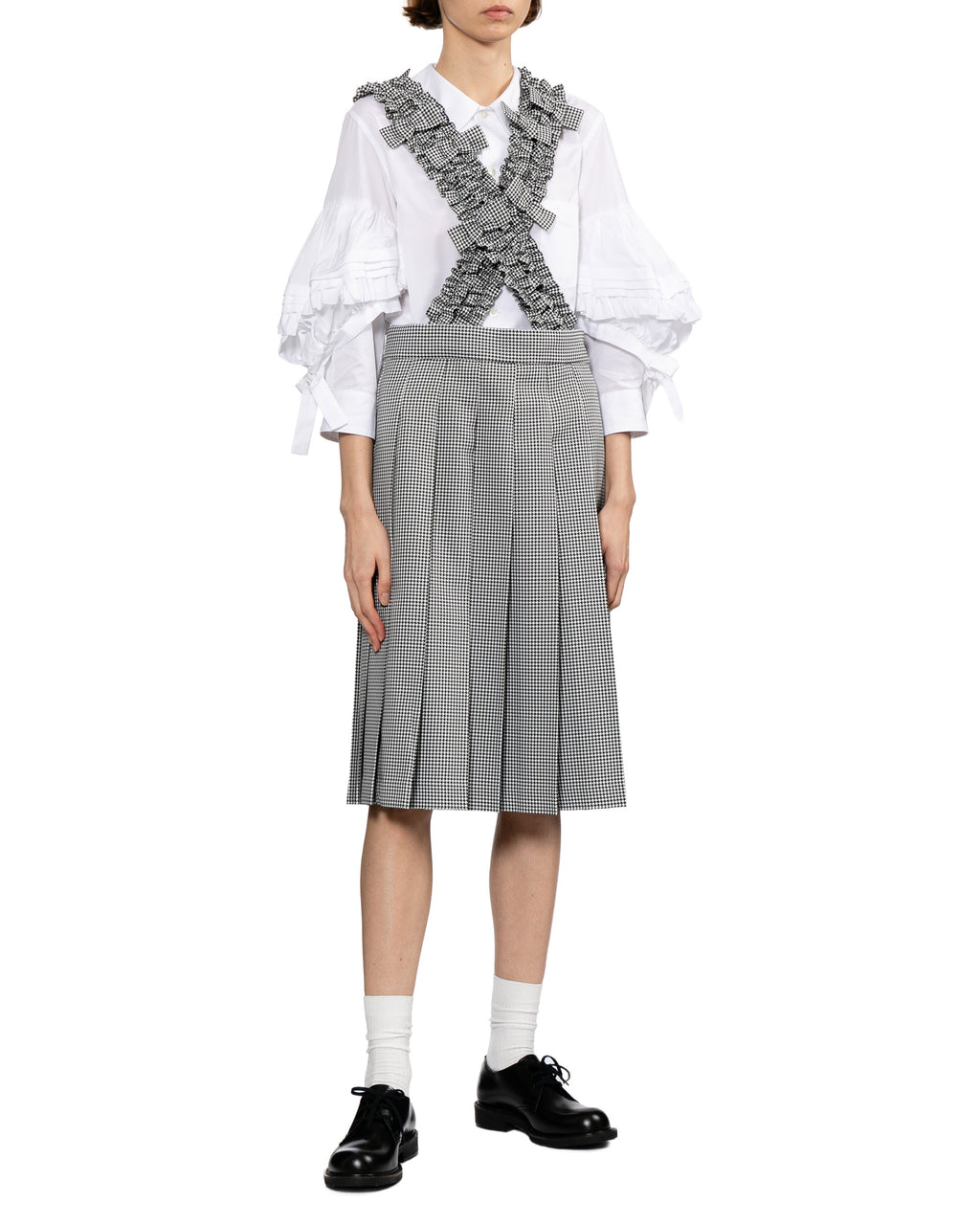 Pleated skirt with suspender straps