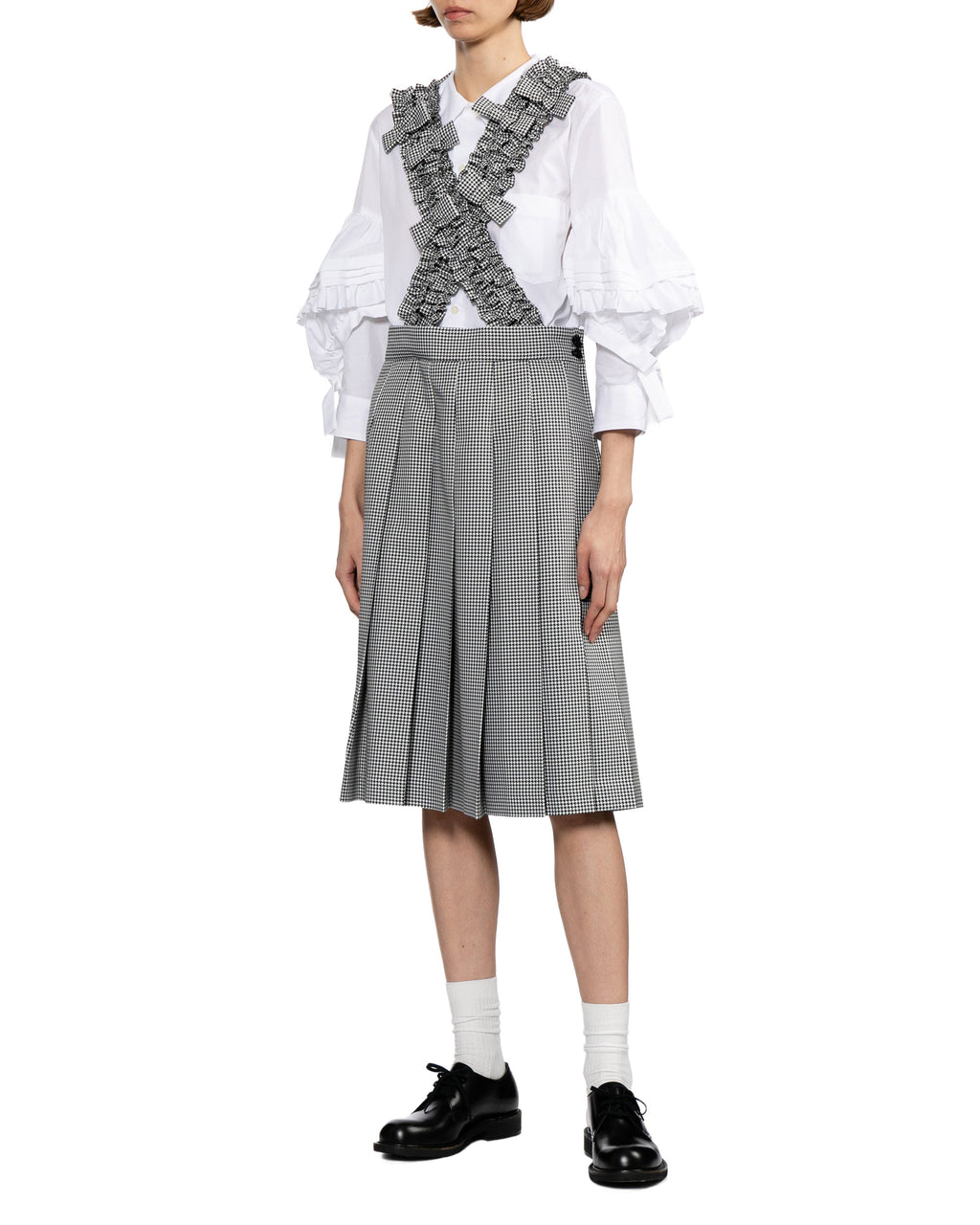 Pleated skirt with suspender straps