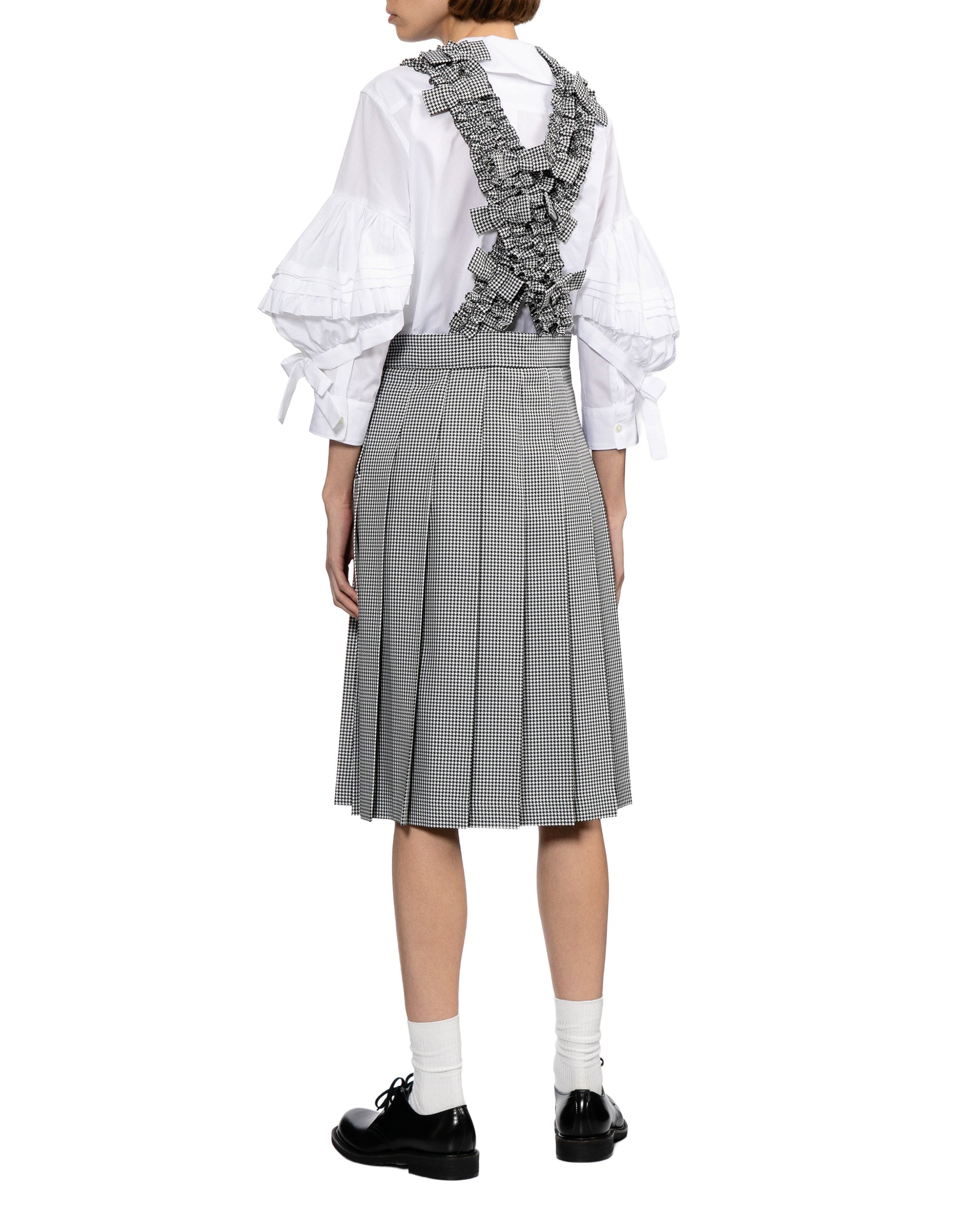 Pleated skirt with suspender straps