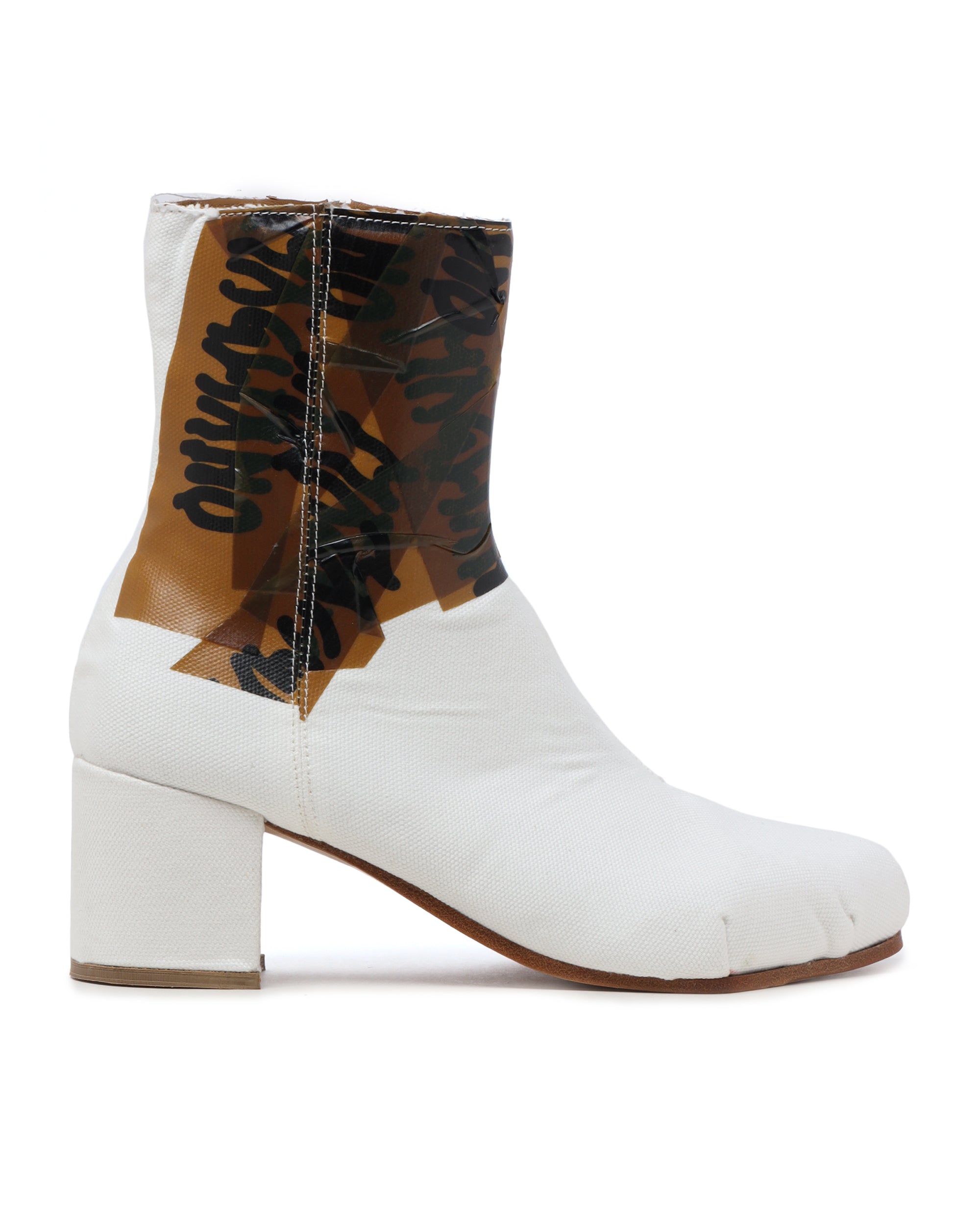 Printed distressed boots