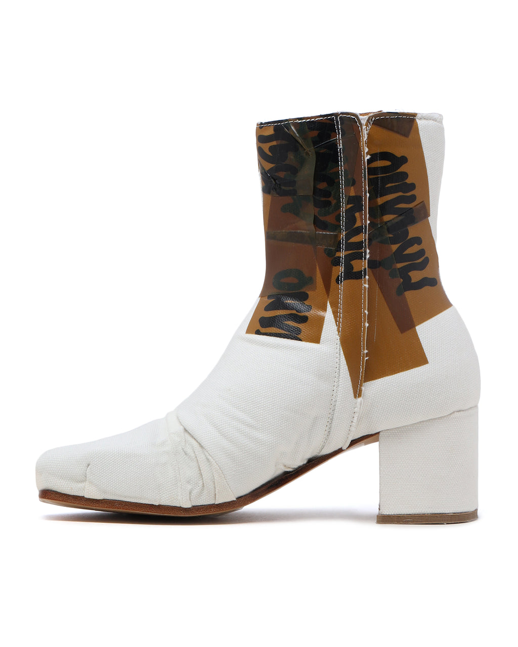 Printed distressed boots