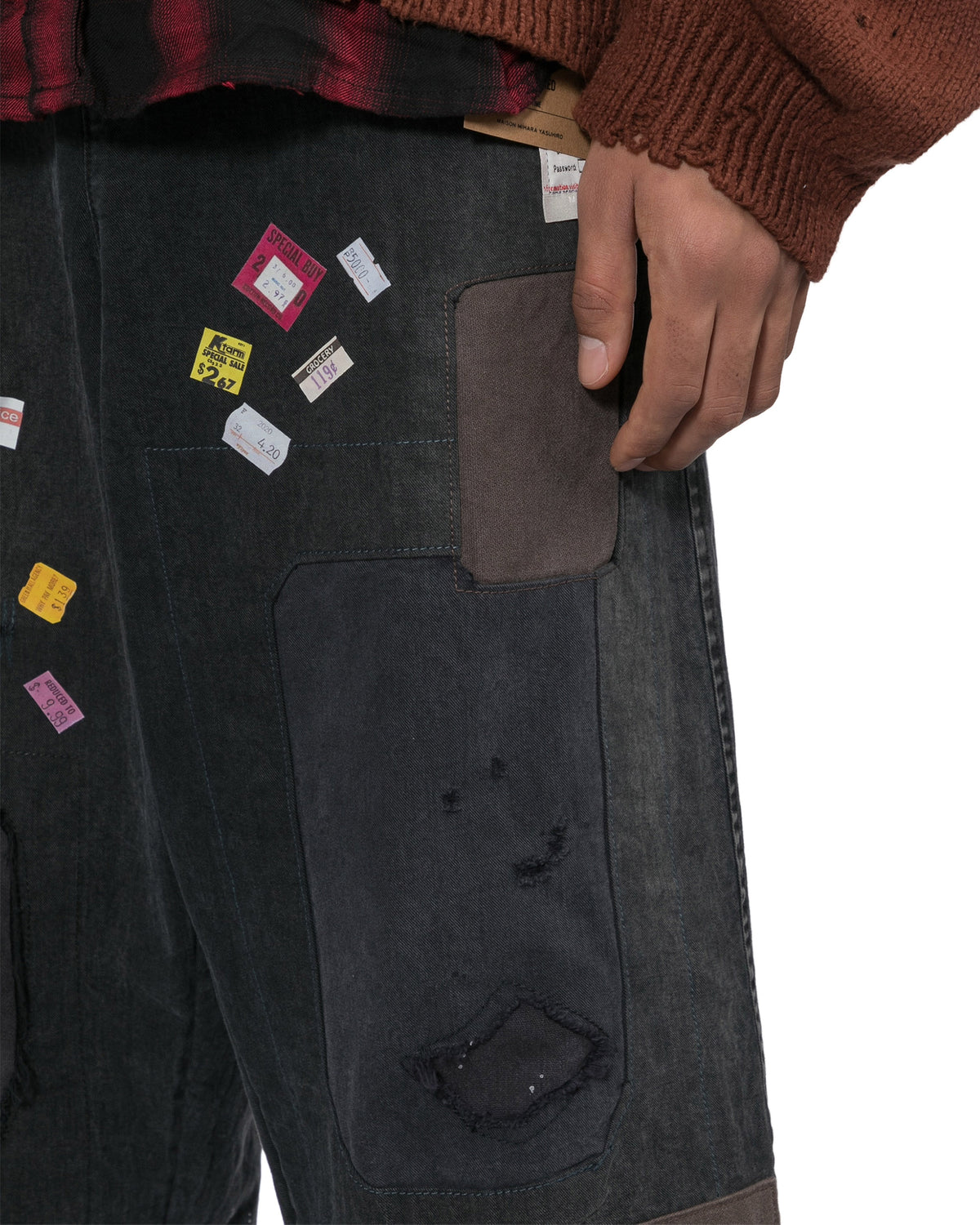Price tag sticker distressed jeans