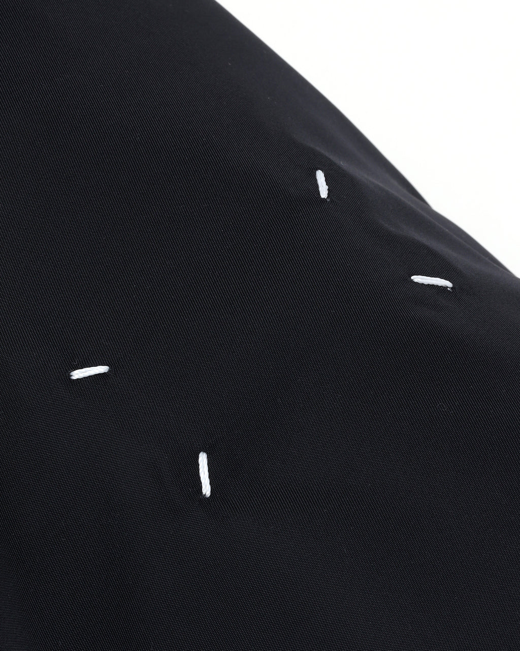Four-stitch shoulder bag