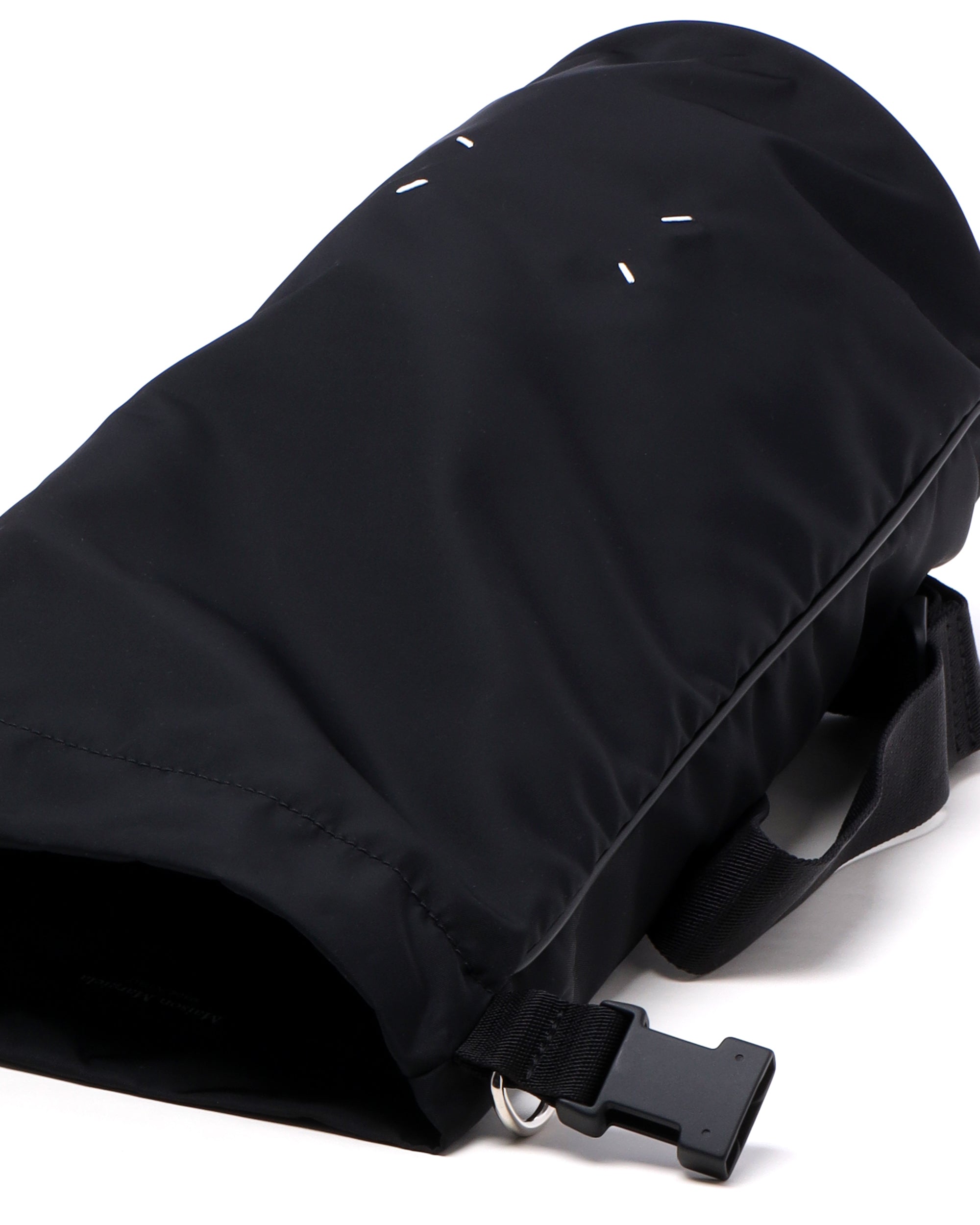 Four-stitch shoulder bag