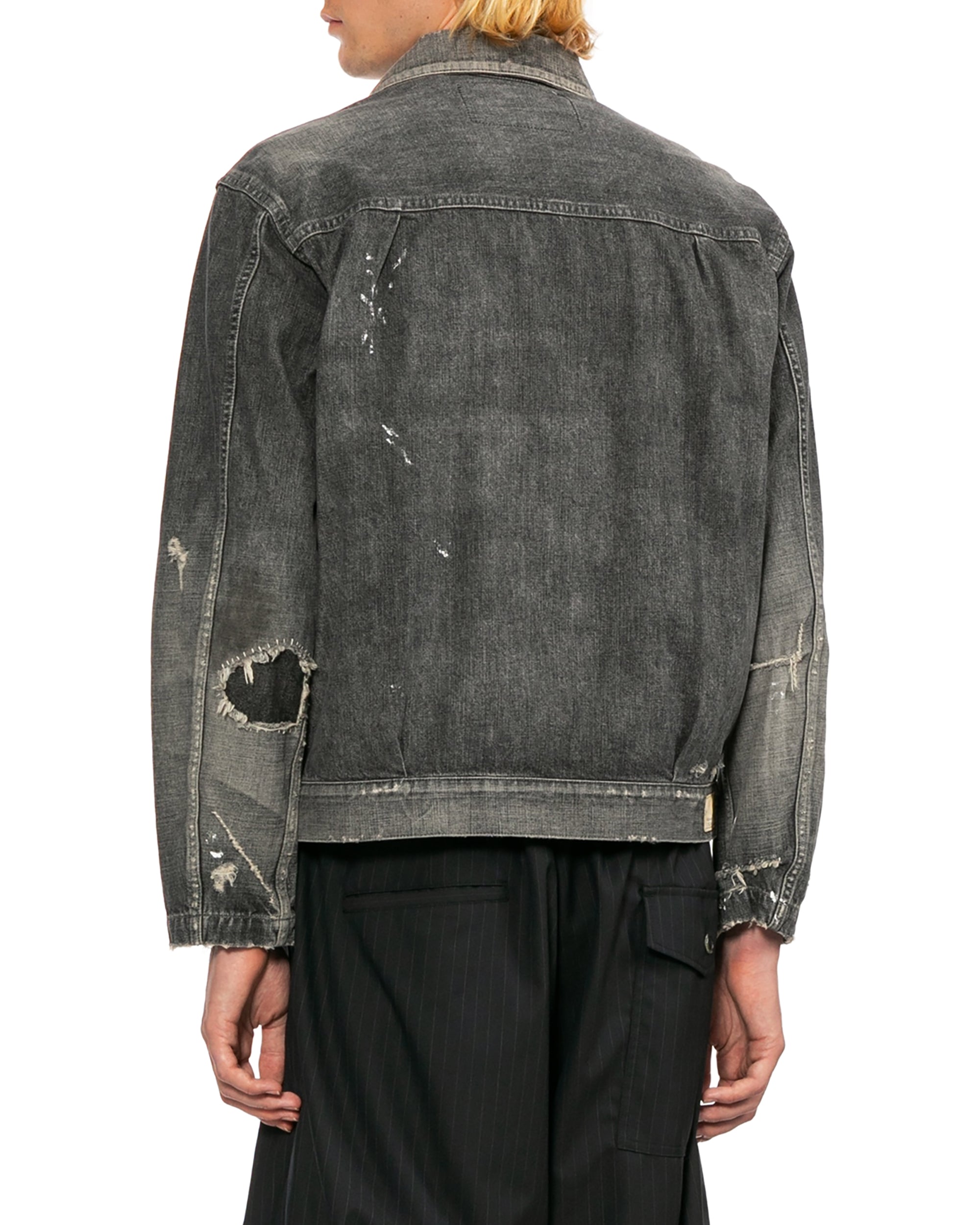 Distressed denim jacket
