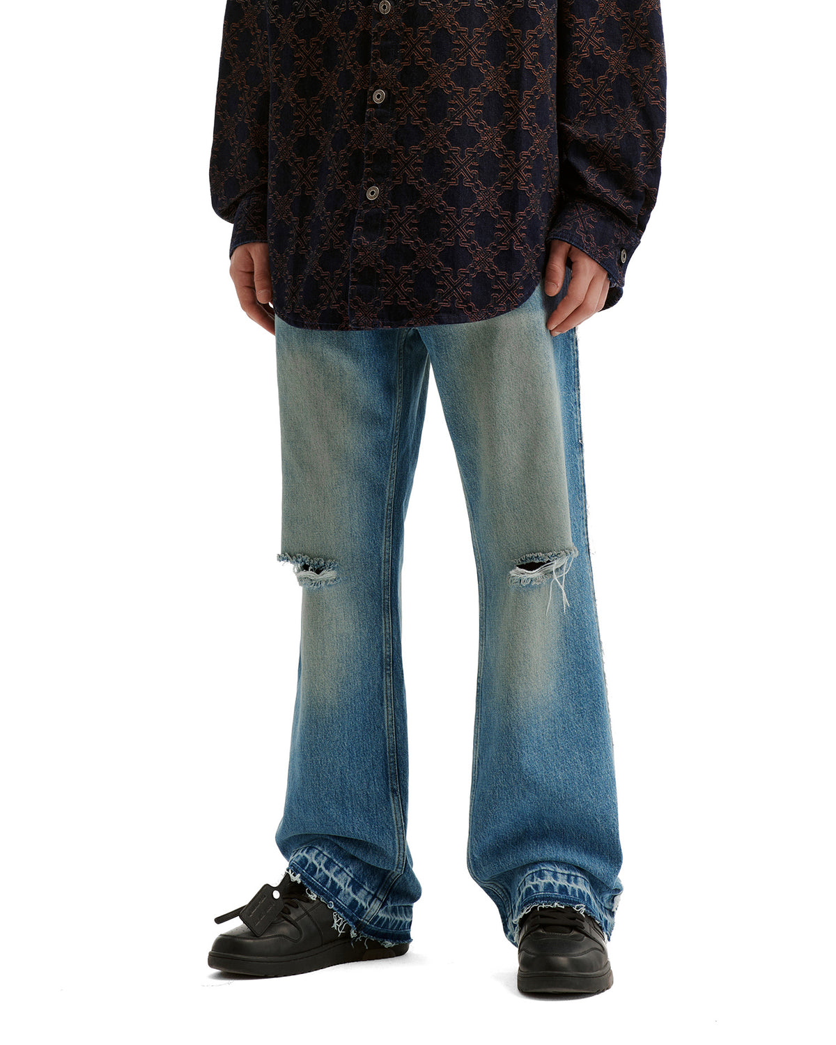 Distressed flared jeans