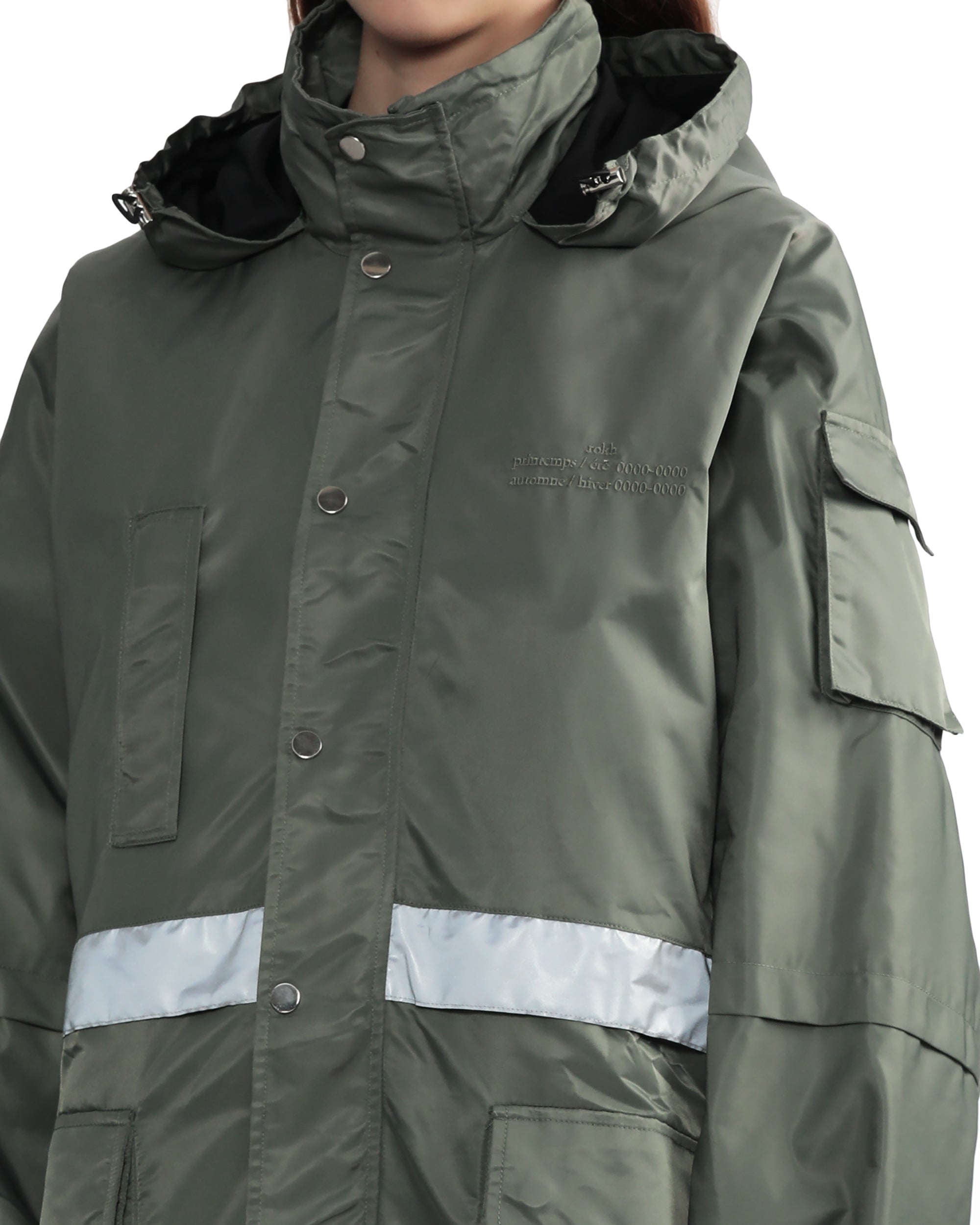 Contrasting strap detail coat