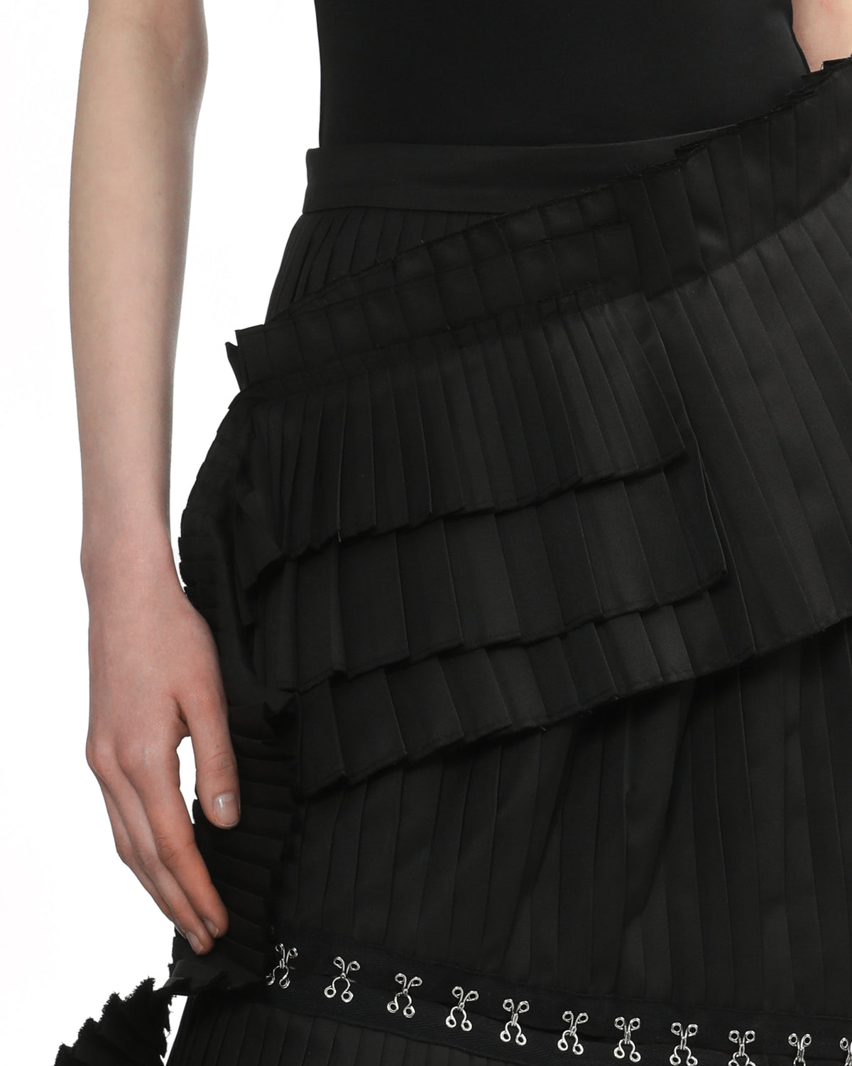 Asymmetric pleated skirt