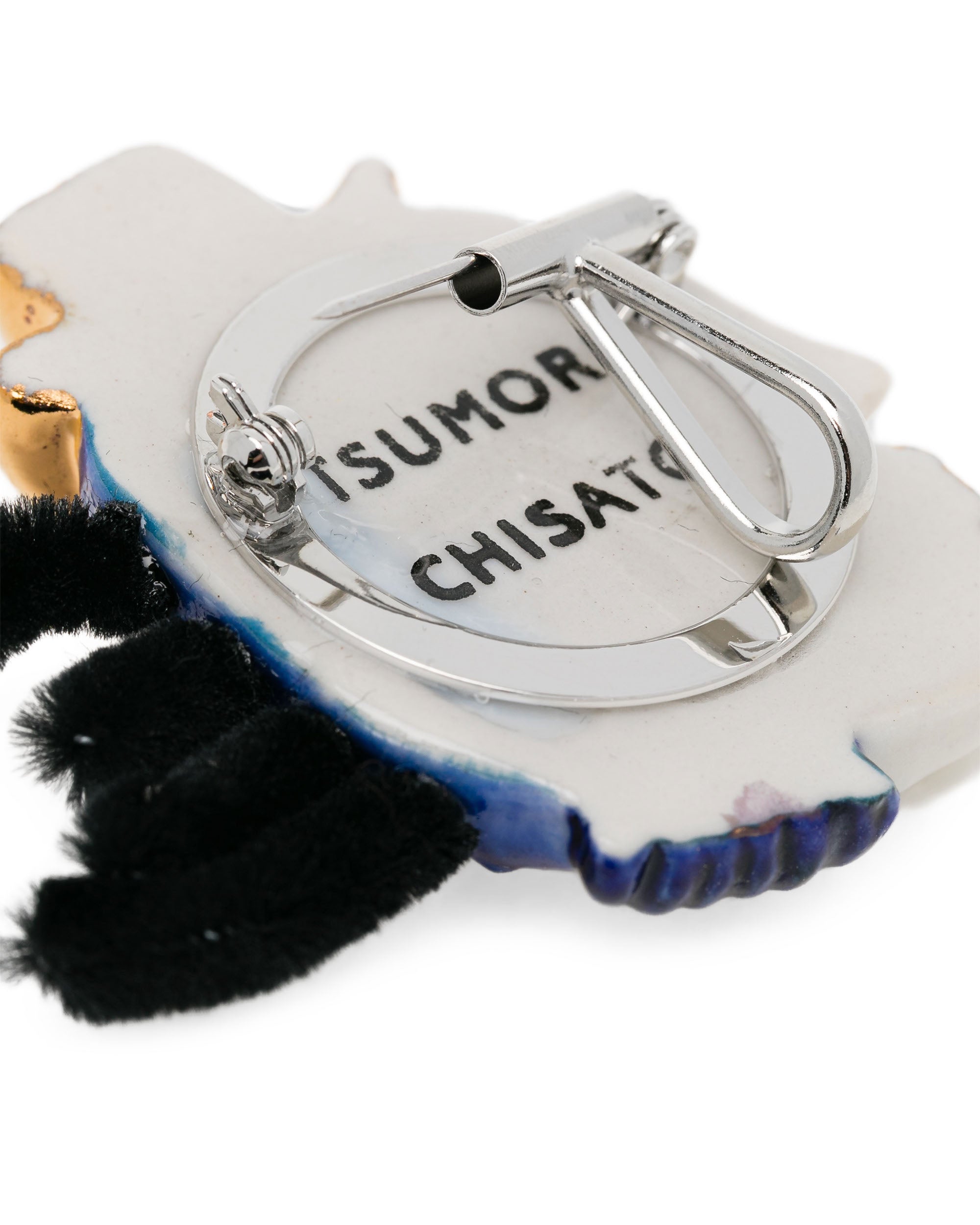 Face brooch