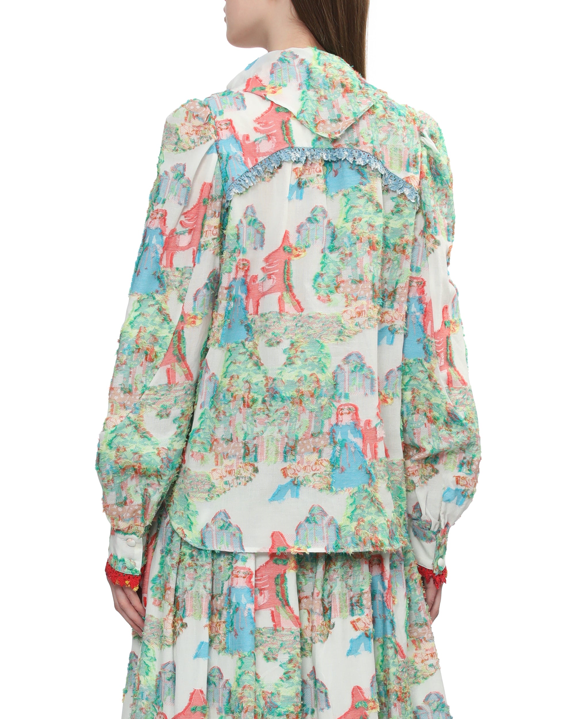 Embroidered button down top