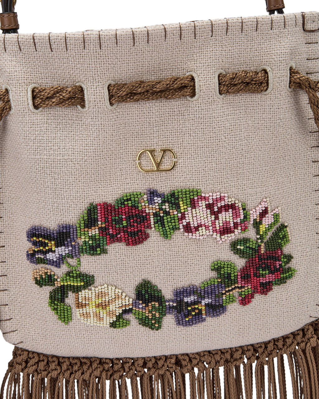Embroidered tasselled bag